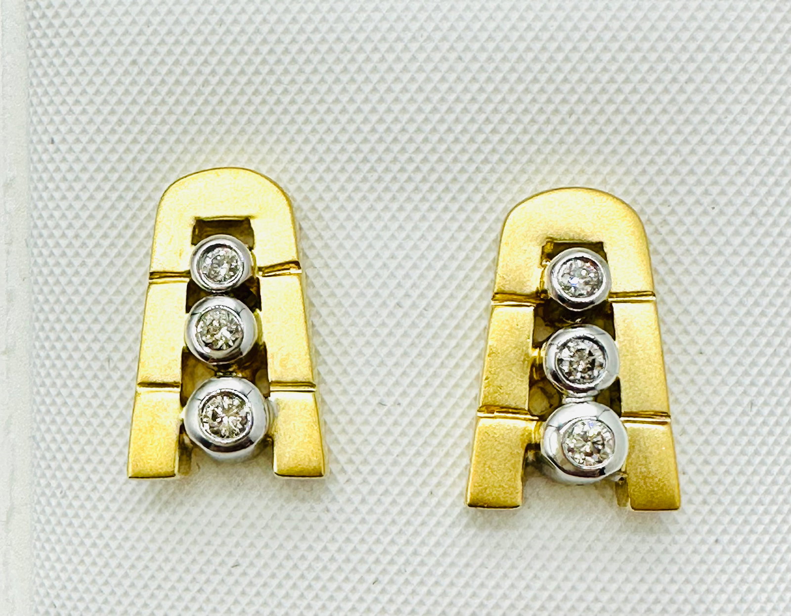 18KT White and Yellow Gold,Pair of Natural Diamond Earrings # 2745: # 2745 18KT White and Yellow Gold,Pair of Natural Diamond Earrings 6 pieces diamond 0.15 carats(t.w.) Post Black Earrings Weight: 6.10 grams(t.w.) Earrings Size: 13.5 mm X 8.50 mm