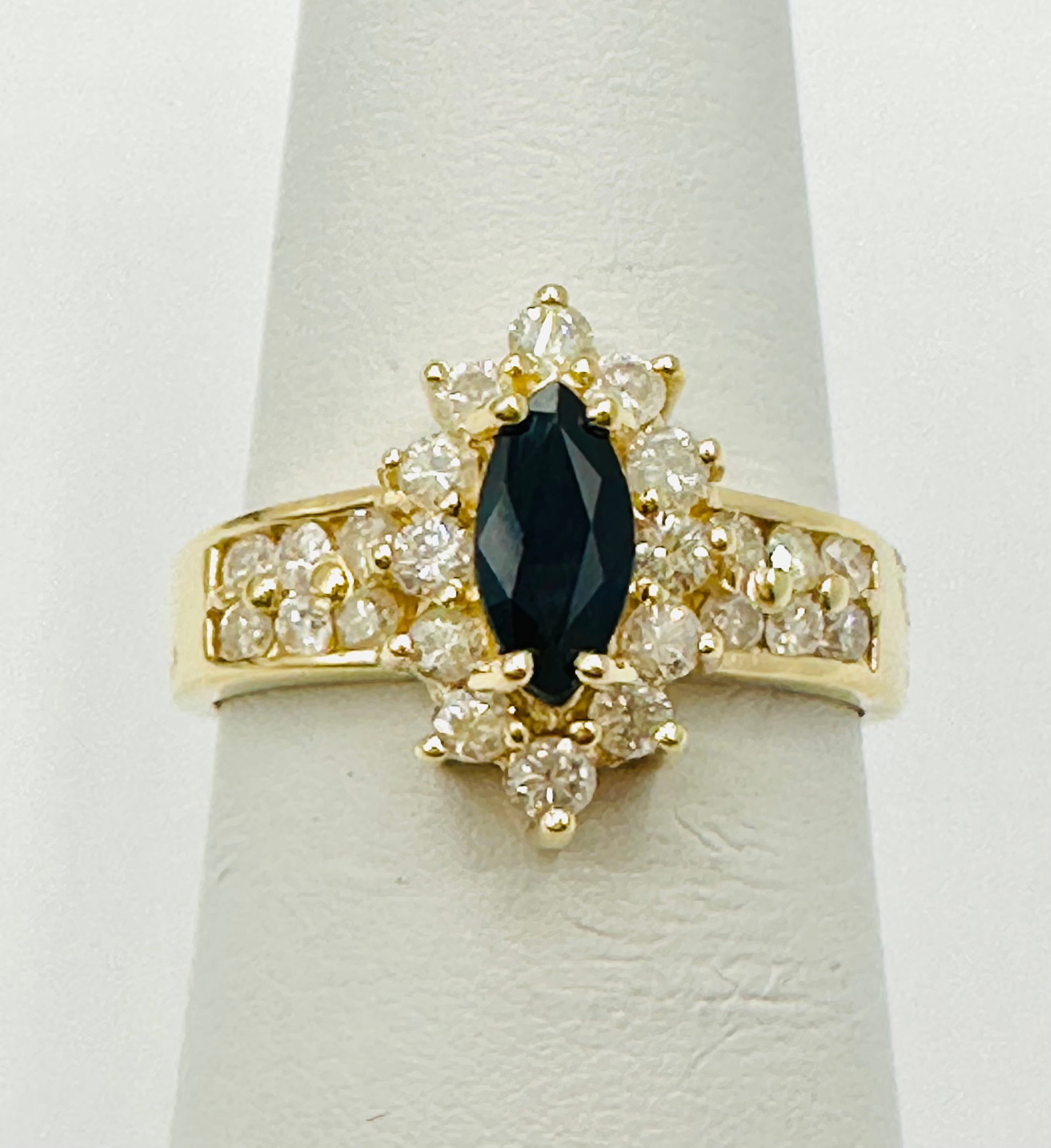 Natural Diamond and Sapphire Ring,14KT Yellow Gold # 2768: # 2768 Natural Diamond and Sapphire Ring,14KT Yellow Gold 24 pieces diamond 0.50 carat( t.w.) 1 piece marquis sapphire 0.45 carat Ring Weight: 3.70 grams(t.w.) Ring Size: 5.75