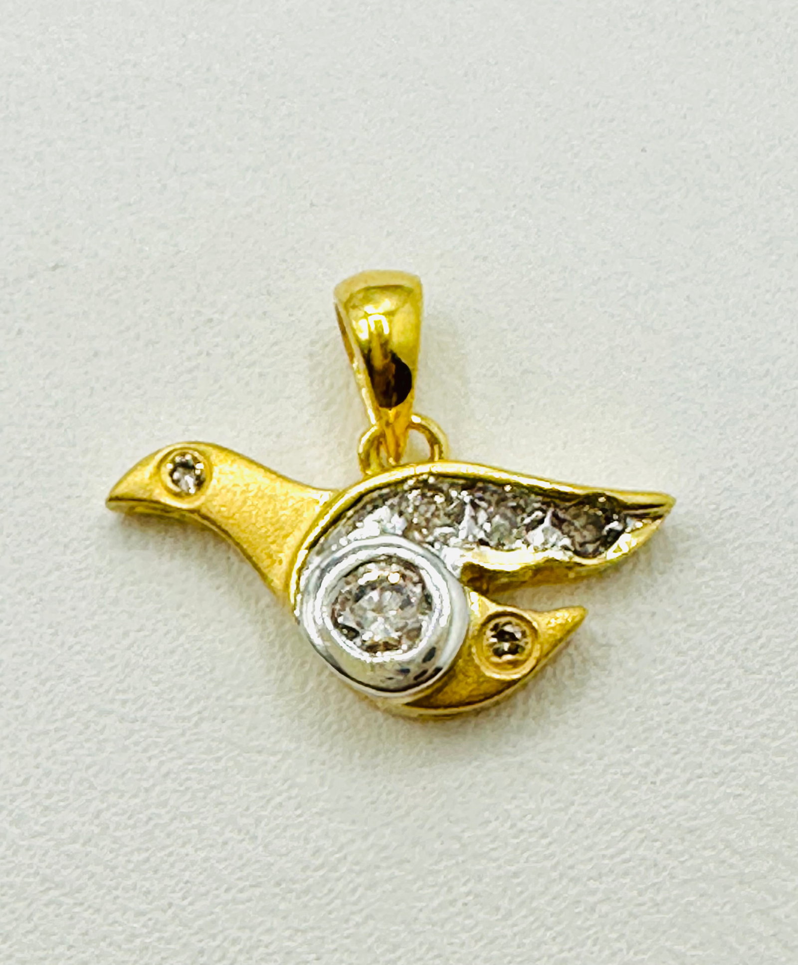 18KT Yellow Gold Natural Diamond Pendant # 2784: # 2784 18KT Yellow Gold Natural Diamond Pendant 6 pieces diamond 0.12 carat (t.w.) Pendant Weight: 1.20 grams (t.w.) Pendant size: 12 mm X 15 mm