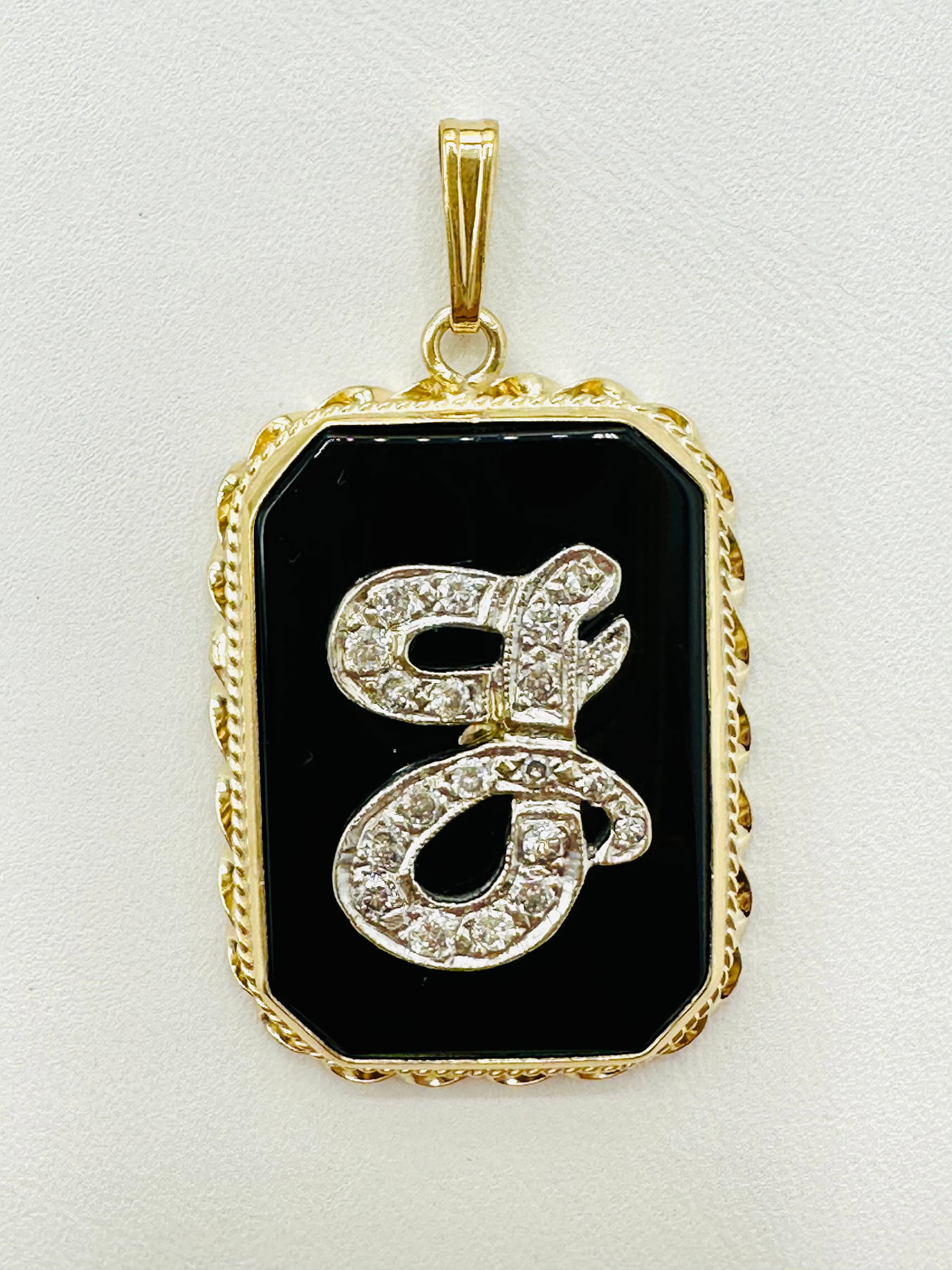 Natural Diamond Initial J Onyx Pendant, 14KT Yellow and White Gold # 2796: # 2796 Natural Diamond Initial J Onyx Pendant, 14KT Yellow and White Gold 20 pieces diamond 0.45 carat( t.w.) Pendant Weight: 6.5 grams(t.w.) Pendant Size: 38 mm x 21.5 mm