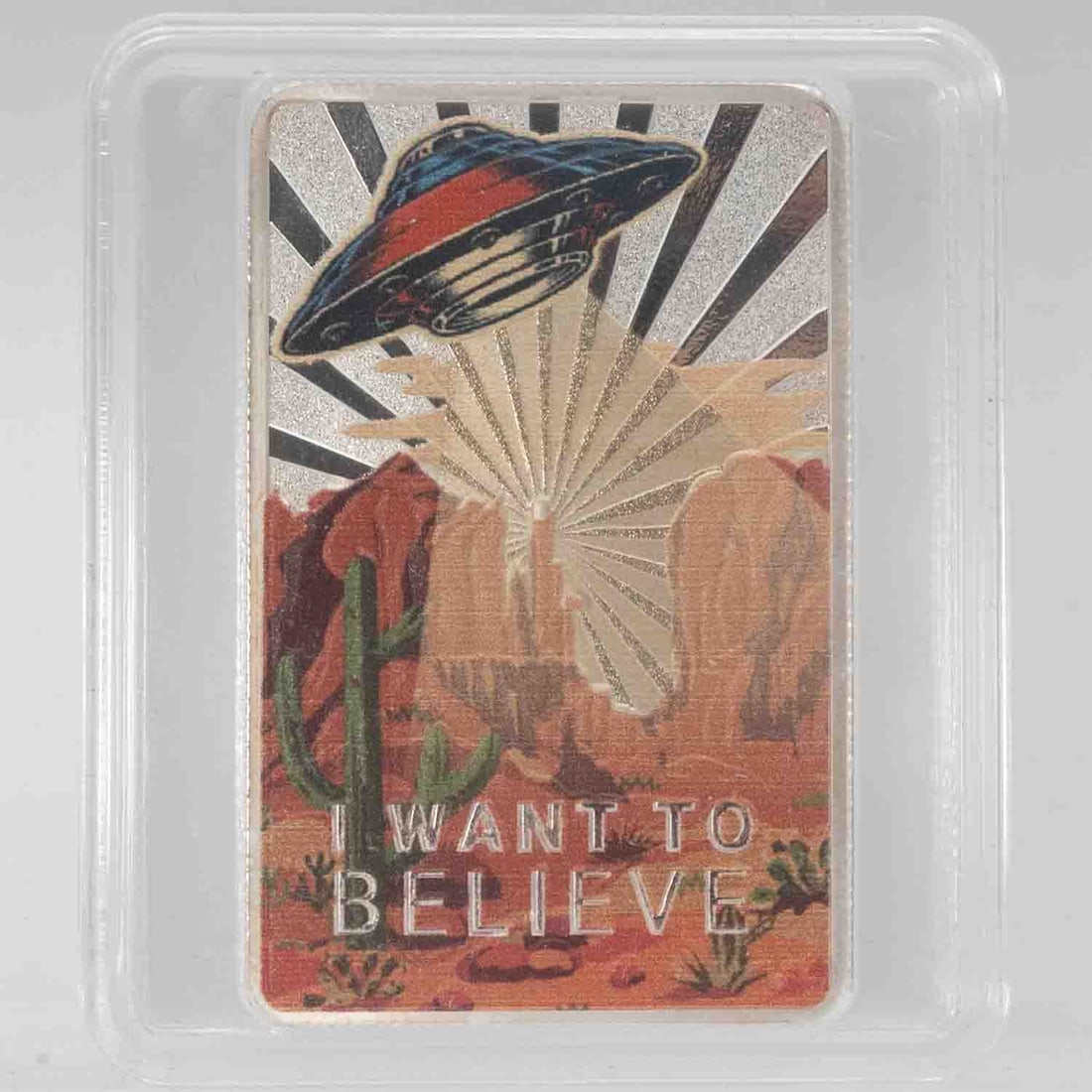 2023 Rogue Island Mint UFO I Want To Believe 1oz Colorized Art bar: MLC01415 Provenance: Acquired from reputable coin dealers. Subject: Rogue Island Mint UFO I Want To Believe 1oz Colorized Art bar Medium: 999 SIlver Year: 2023 Condition: MS Note: Any condition statem