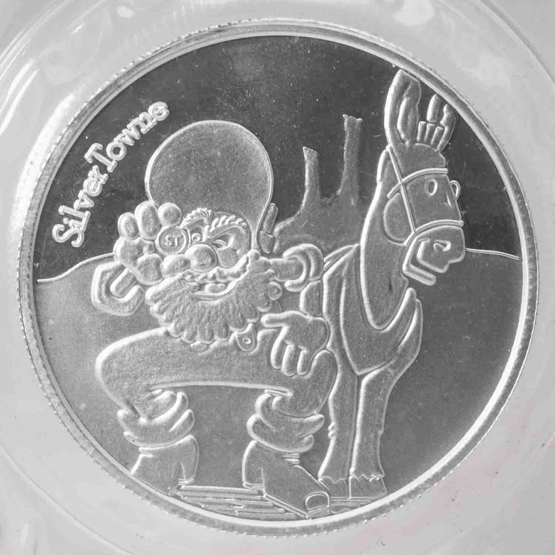 SilverTowne Prospector Cartoon Style 1oz Silver Round: MLC01442 Provenance: Acquired from reputable coin dealers. Subject: SilverTowne Prospector Cartoon Style 1oz Silver Round Medium: 999 SIlver Year: Condition: MS Note: Any condition statement is given 