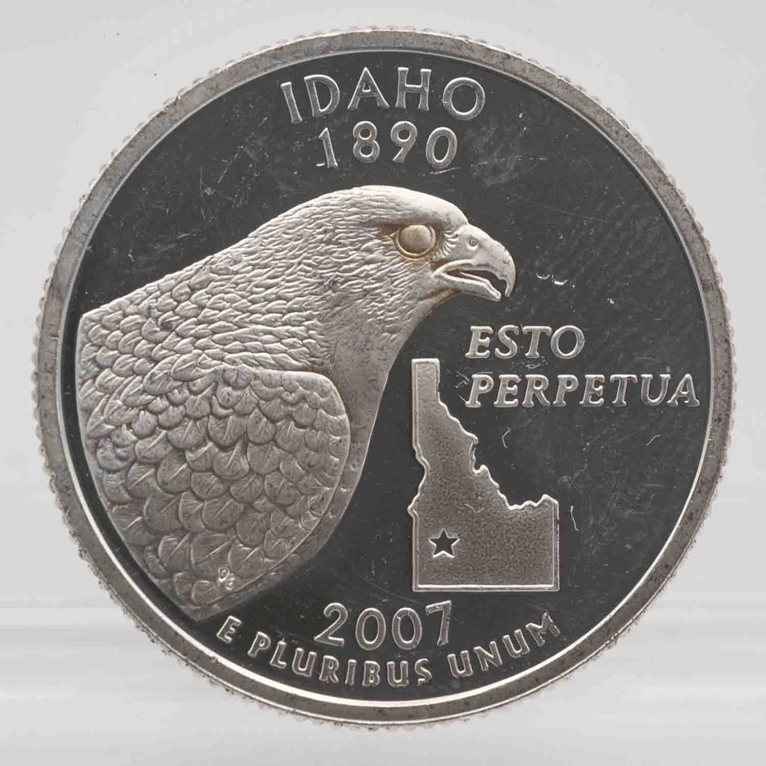 2007 American Proof Silver Quarter Idaho: MLC01241 Provenance: Acquired from reputable coin dealers. Subject: American Proof Silver Quarter Idaho Medium: 900 Silver Year: 2007 Condition: AU Note: Any condition statement is given as an opinion