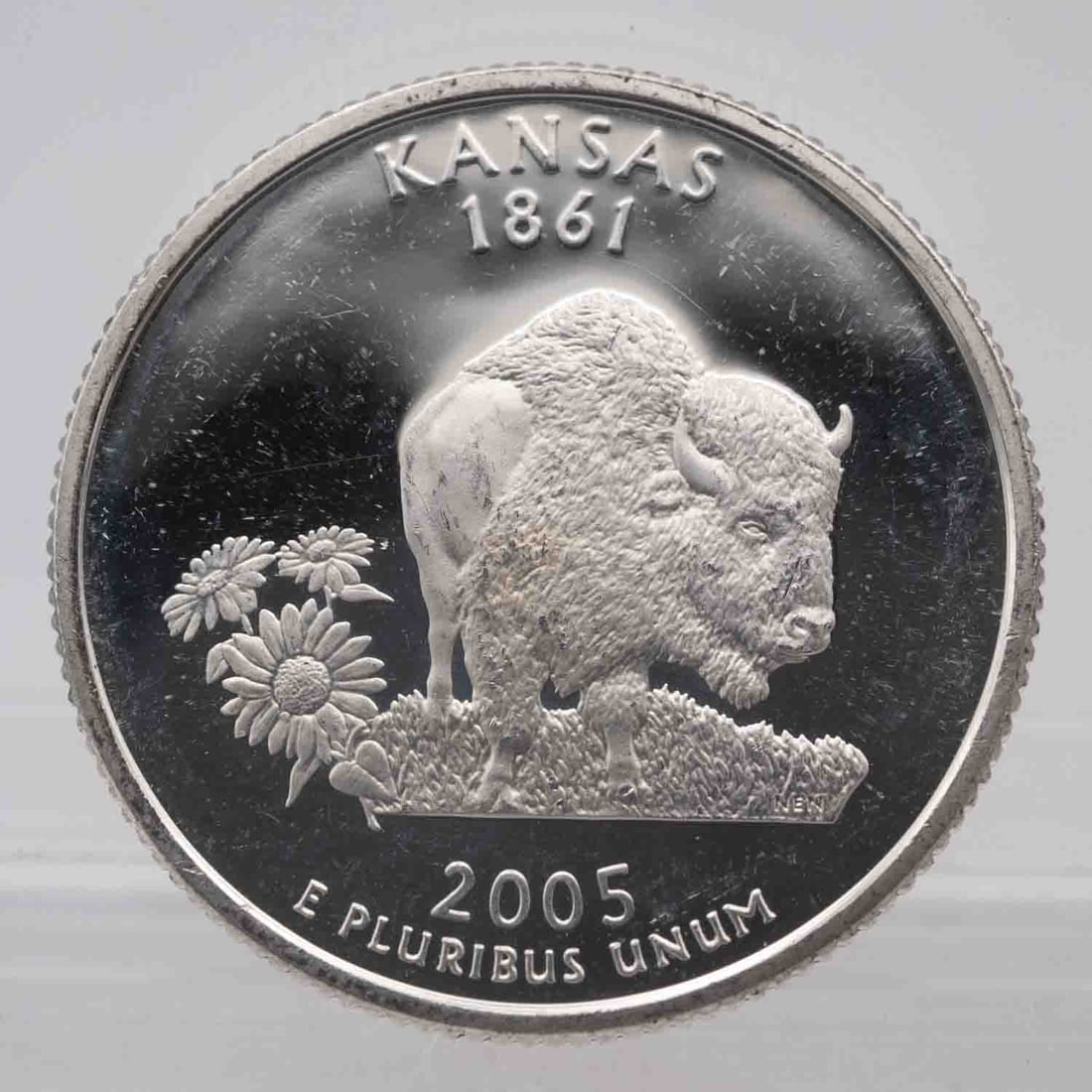 2005 American Proof Silver Quarter Kansas: MLC01179 Provenance: Acquired from reputable coin dealers. Subject: American Proof Silver Quarter Kansas Medium: 900 Silver, approx 0.18 ozt Year: 2005 Condition: MS/AU+, Proof Note, multiple availabl