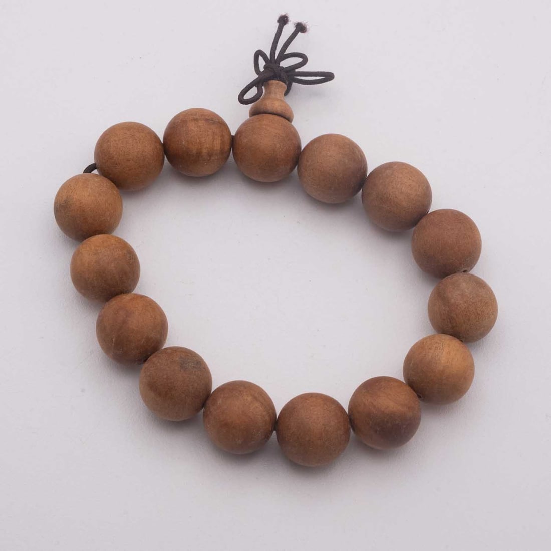 Vintage Chinese Sandalwood Prayer Bead Bracelet: Medium: Sandalwood Size: 0.6X0.6 inches Age/Detail: Vintage Chinese Condition: great overall, check photo for condition reference. Provenance: Collection from Estate in Williamsburg Please view all th