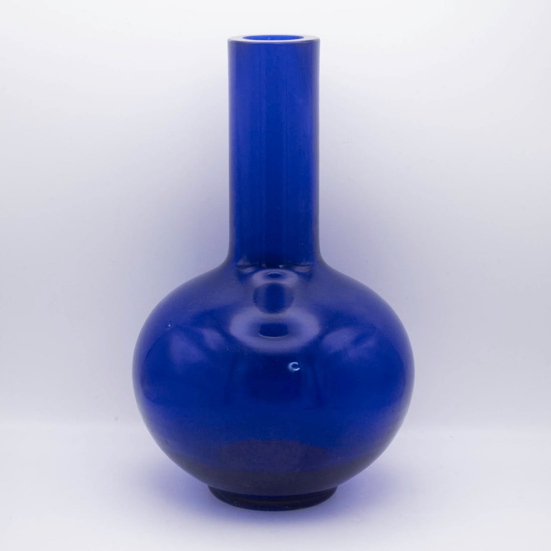 Antique Chinese Cobalt Blue Peking Glass Vase: Medium: Cobalt Blue Peking Glass Size: 7x7x12 inches Age/Detail: Antique Chinese Condition: great overall, check photo for condition reference. Chinese-style cobalt blue glass bottle vase, with rounde