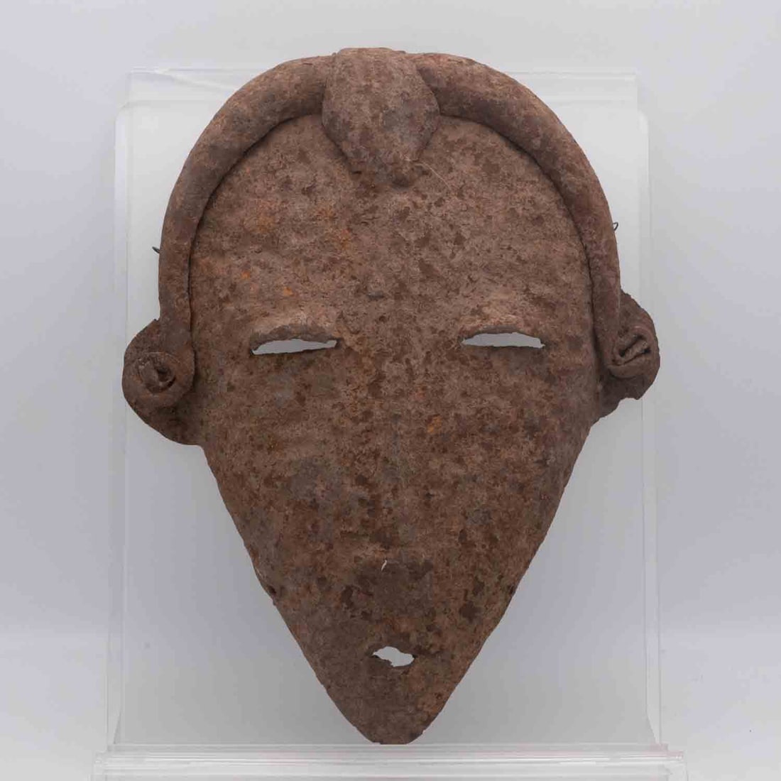 Antique African Metal Mask: Medium: Metal Size: 8.3x11.6x2 inches Age/Detail: Antique African Condition: great overall, rust. check photo for condition reference. Provenance: Collection from Estate in Williamsburg Please view al
