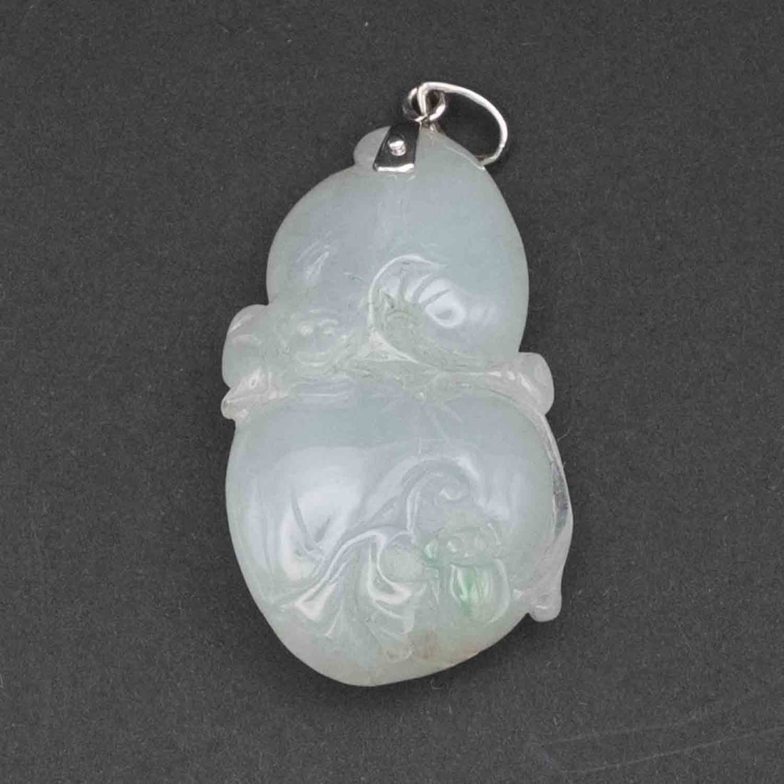 Chinese Carved Natural White Jadeite Gourd Pendant: Medium: Natural White Jadeite Size: 1.3x0.7x0.5 inches Age/Detail: Chinese Carved Condition: great overall, check photo for condition reference. Provenance: Collection from Estate in Tribecca Please v