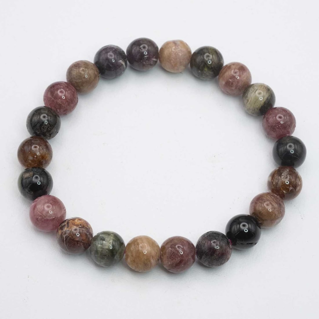 Natural Tourmaline Bead Bracelet: Medium: Tourmaline Size: 9mm diameter each bead Age/Detail: Natural Condition: great overall, check photo for condition reference. Provenance: Collection from Estate in Williamsburg Please view all th