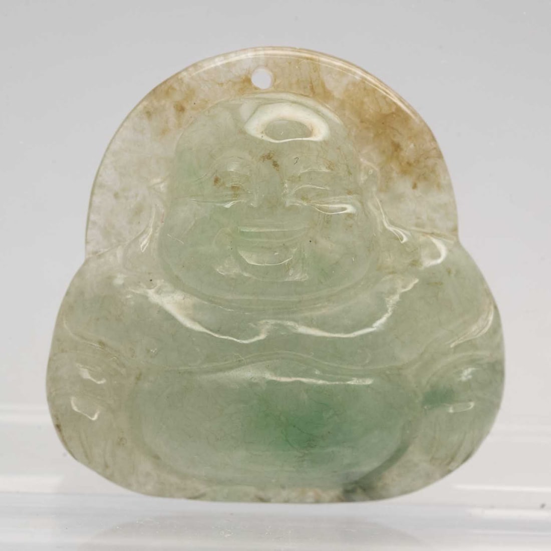 Chinese Carved Natural Jadeite Buddha Pendant: Medium: Natural Jadeite Size: 0.8x0.8x0.2 inches Age/Detail: Chinese Carved Condition: great overall, check photo for condition reference. Provenance: Collection from Estate in Williamsburg Please vie