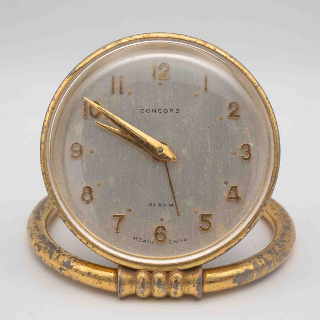 Vintage Concord 8 Day Swiss Alarm Clock: Medium: 8 Day Swiss Size: 2.7x2.7x1 inches Age/Detail: Vintage Concord Condition: great overall, works when windeded, but the second hand seems to be stuck, check photo for condition reference, Please