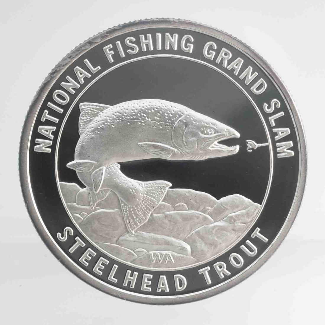 North American Fishing Club Steelhead Trout 1oz SIlver Round: MLC01435 Provenance: Acquired from reputable coin dealers. Subject: North American Fishing Club Steelhead Trout 1oz SIlver Round Medium: 999 SIlver Year: Condition: MS Note: Any condition statement