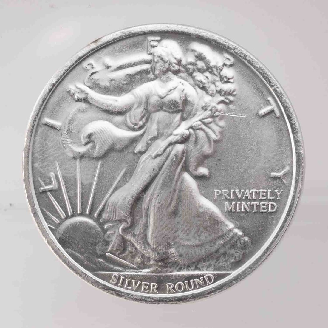 Vintage Walking Liberty Design 1oz Silver Round: MLC01412 Provenance: Acquired from reputable coin dealers. Subject: Vintage Walking Liberty Design 1oz Silver Round Medium: 999 SIlver Year: Condition: MS Note: Any condition statement is given as an