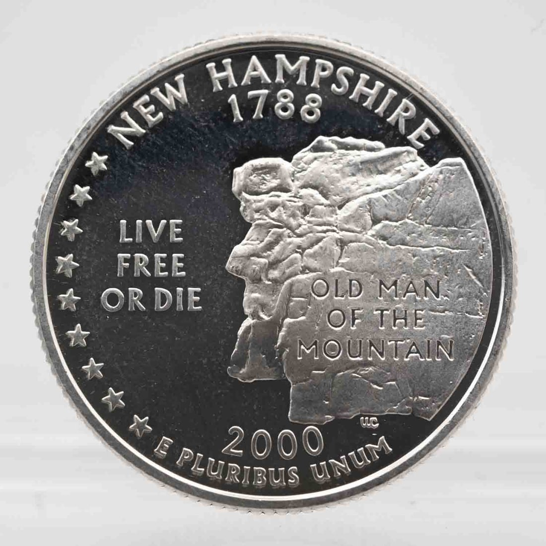 2000 American Proof State Silver Quarter New Hampshire: MLC01282 Provenance: Acquired from reputable coin dealers. Subject: American Proof State Silver Quarter New Hampshire Medium: 900 Silver Year: 2000 Condition: AU+/MS- Sample photo, might have differen