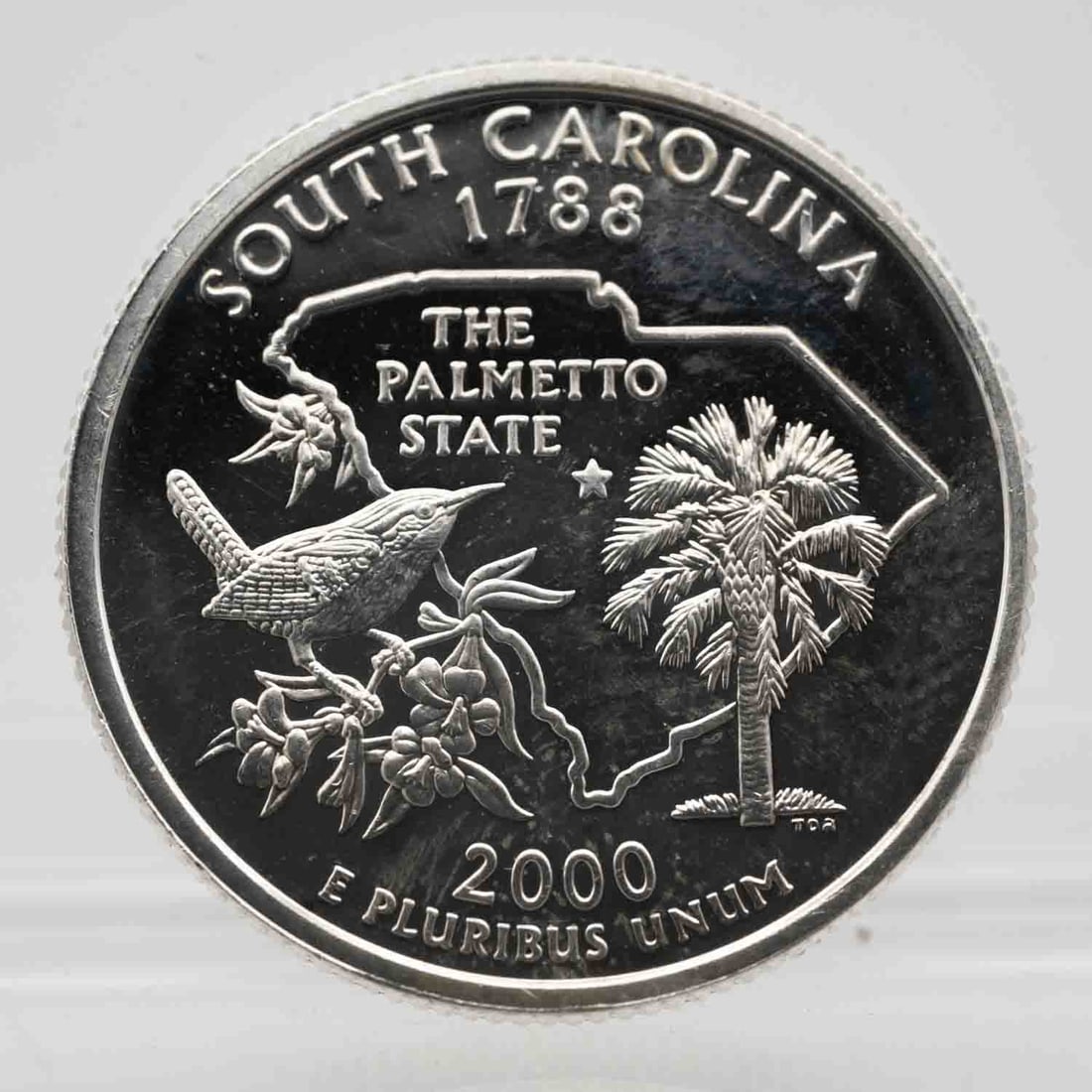 2000 American Proof Silver Quarter South Carolina: MLC01256 Provenance: Acquired from reputable coin dealers. Subject: American Proof Silver Quarter South Carolina Medium: 900 Silver Year: 2000 Condition: AU Note: Any condition statement is given as a