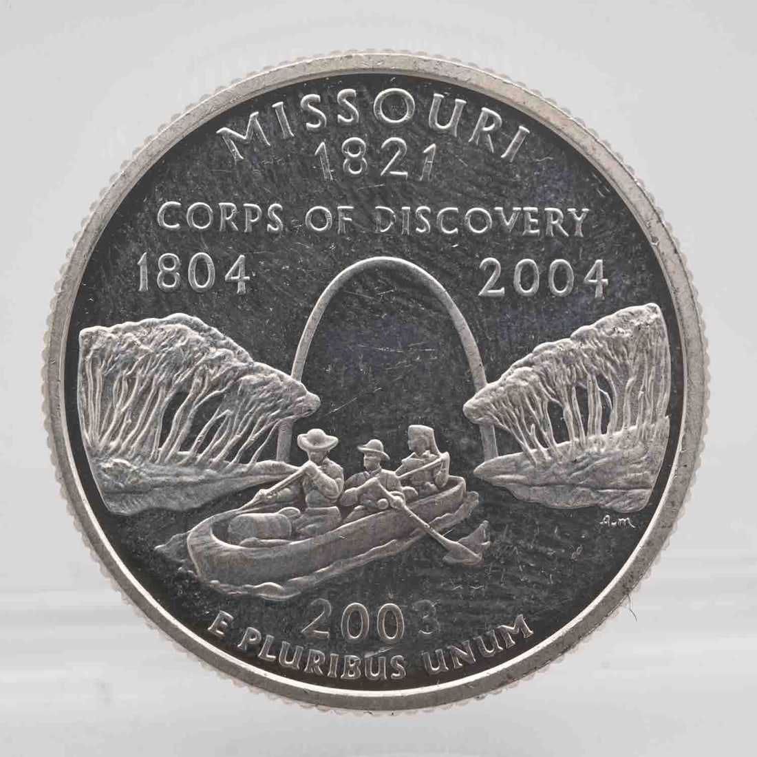 2003 American Proof Silver Quarter Missouri: MLC01250 Provenance: Acquired from reputable coin dealers. Subject: American Proof Silver Quarter Missouri Medium: 900 Silver Year: 2003 Condition: AU Note: Any condition statement is given as an opin