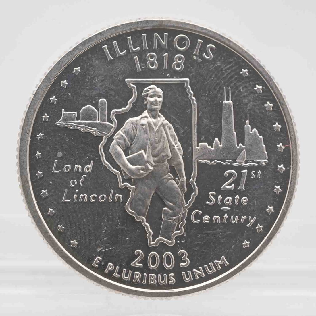 2003 American Proof Silver Quarter Illinois: MLC01243 Provenance: Acquired from reputable coin dealers. Subject: American Proof Silver Quarter Illinois Medium: 900 Silver Year: 2003 Condition: AU Note: Any condition statement is given as an opin