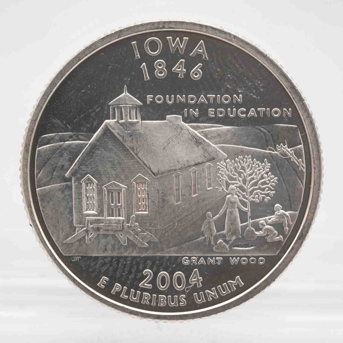 2004 American Proof Silver Quarter Iowa: MLC01242 Provenance: Acquired from reputable coin dealers. Subject: American Proof Silver Quarter Iowa Medium: 900 Silver Year: 2004 Condition: AU Note: Any condition statement is given as an opinion 