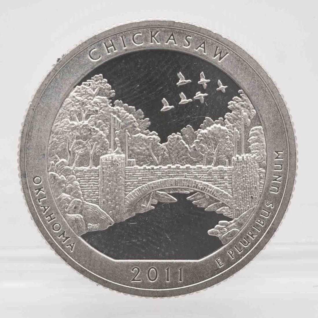 2011 American Proof Silver Quarter ATB Chickasaw: MLC01237 Provenance: Acquired from reputable coin dealers. Subject: American Proof Silver Quarter ATB Chickasaw Medium: 900 Silver Year: 2011 Condition: AU Note: Any condition statement is given as an