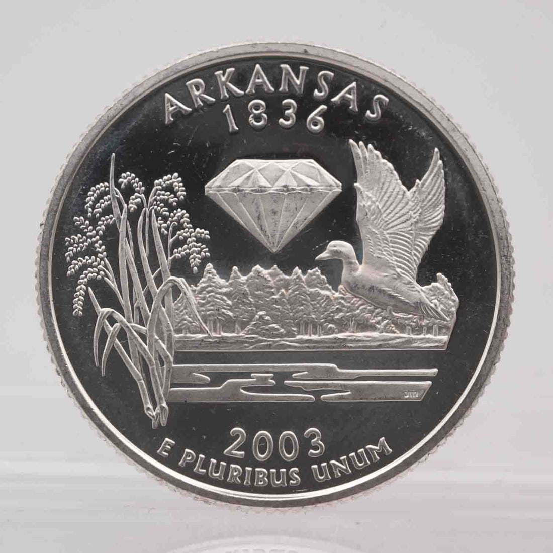2002 American Proof Silver Quarter Arkansas: MLC01217 Provenance: Acquired from reputable coin dealers. Subject: American Proof Silver Quarter Arkansas Medium: 900 Silver Year: 2002 Condition: AU Note: Any condition statement is given as an opin