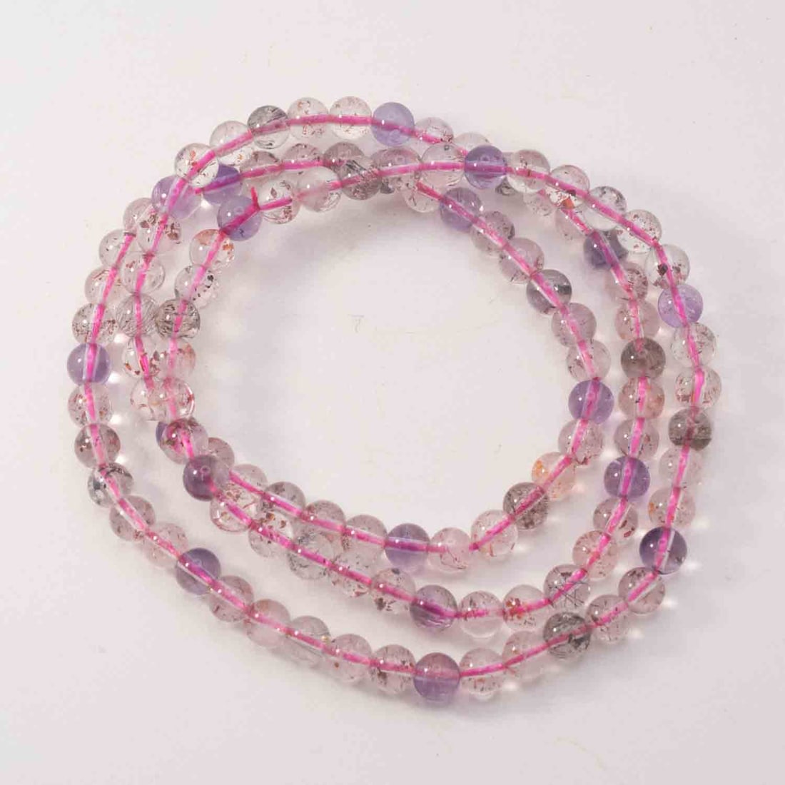 Natural Super Seven Included Quartz Amethyst Round Bead Necklace: Medium: Quartz Amethyst Size: 5mm Age/Detail: Natural Super Seven Included Condition: great overall, check photo for condition reference. Provenance: Please view all the photos as they are part of the