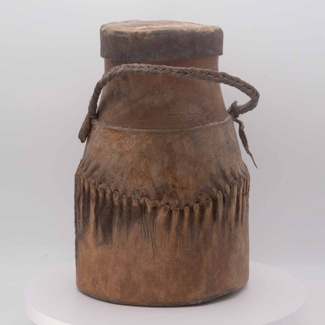 Antique Himalayan Bamboo and Leather Covered Food Container: Medium: Bamboo and Leather Size: 5x5.5x8 inches Age/Detail: Antique Himalayan Condition: great overall, check photo for condition reference. Provenance: Collection from Estate in Williamsburg Please v