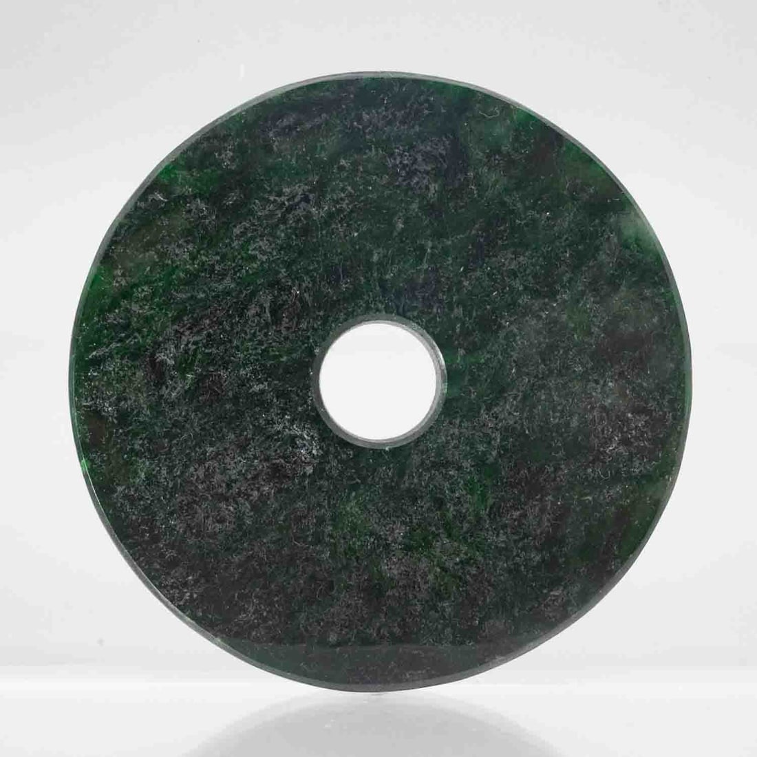 Chinese Dark Green Jadeite Bi Disc Pendant: Medium: Dark Green Jadeite Size: 2.5x2.5x0.5 inches Age/Detail: Chinese Condition: great overall, check photo for condition reference. Provenance: Collection from Estate in Williamsburg Please view al