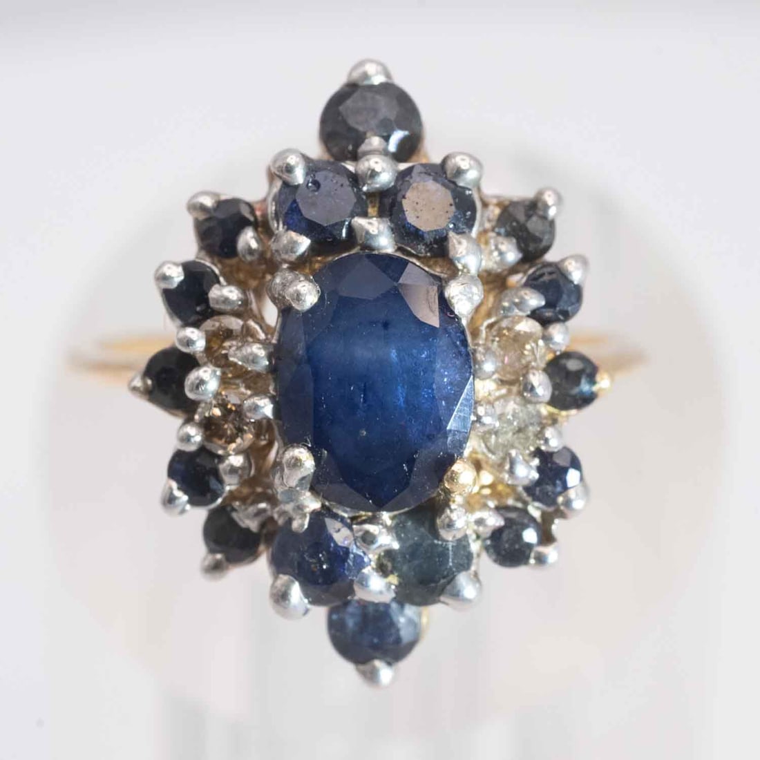 Vintage 14k Gold Natural Sapphire And Diamond Cluster Ring: Medium: Natural Sapphire And Diamond Size: US6.25, 5gram Age/Detail: Vintage 14k Gold Condition: great overall, check photo for condition reference. Provenance: Collection from Estate in Williamsburg 