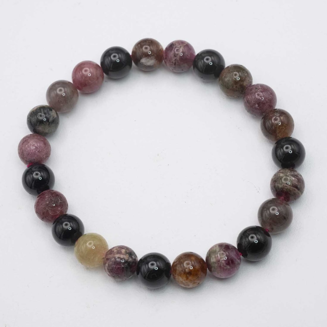 Natural Tourmaline Bead Bracelet: Medium: Tourmaline Size: 8mm diameter each bead Age/Detail: Natural Condition: great overall, check photo for condition reference. Provenance: Collection from Estate in Williamsburg Please view all th