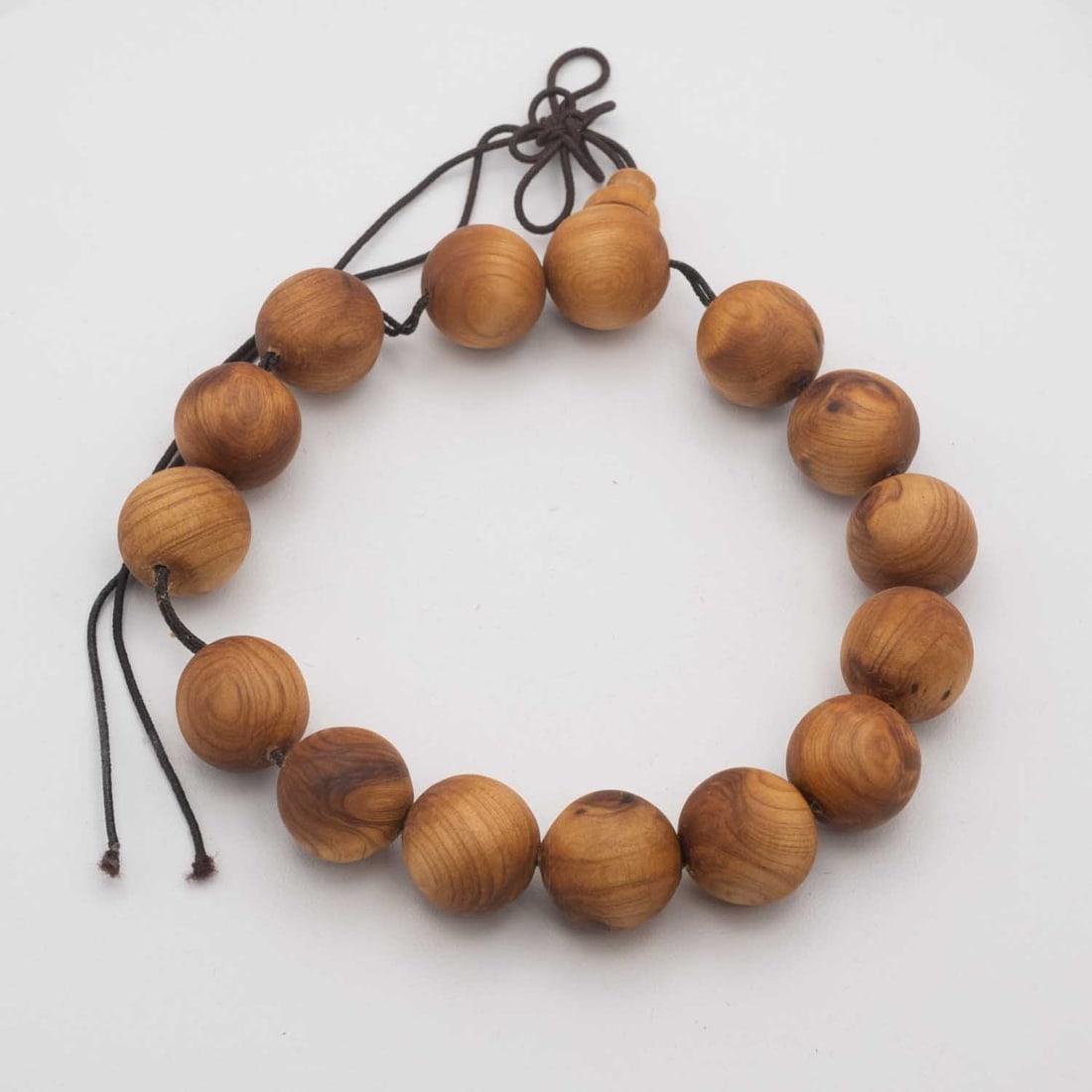 Chinese Cedar Wood Bead Bracelet: Medium: Cedar Wood Size: 15mm Age/Detail: Chinese Condition: great overall, check photo for condition reference. Provenance: Collection from Estate in Williamsburg Please view all the photos as they a
