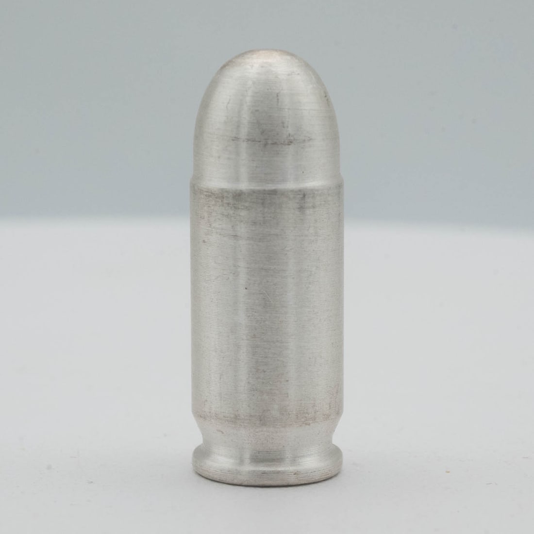 1oz Silver Bullet .45 ACP Style: MLC01433 Provenance: Acquired from reputable coin dealers. Subject: 1oz Silver Bullet .45 ACP Style Medium: 999 SIlver Year: Condition: MS Note: Any condition statement is given as an opinion and shou