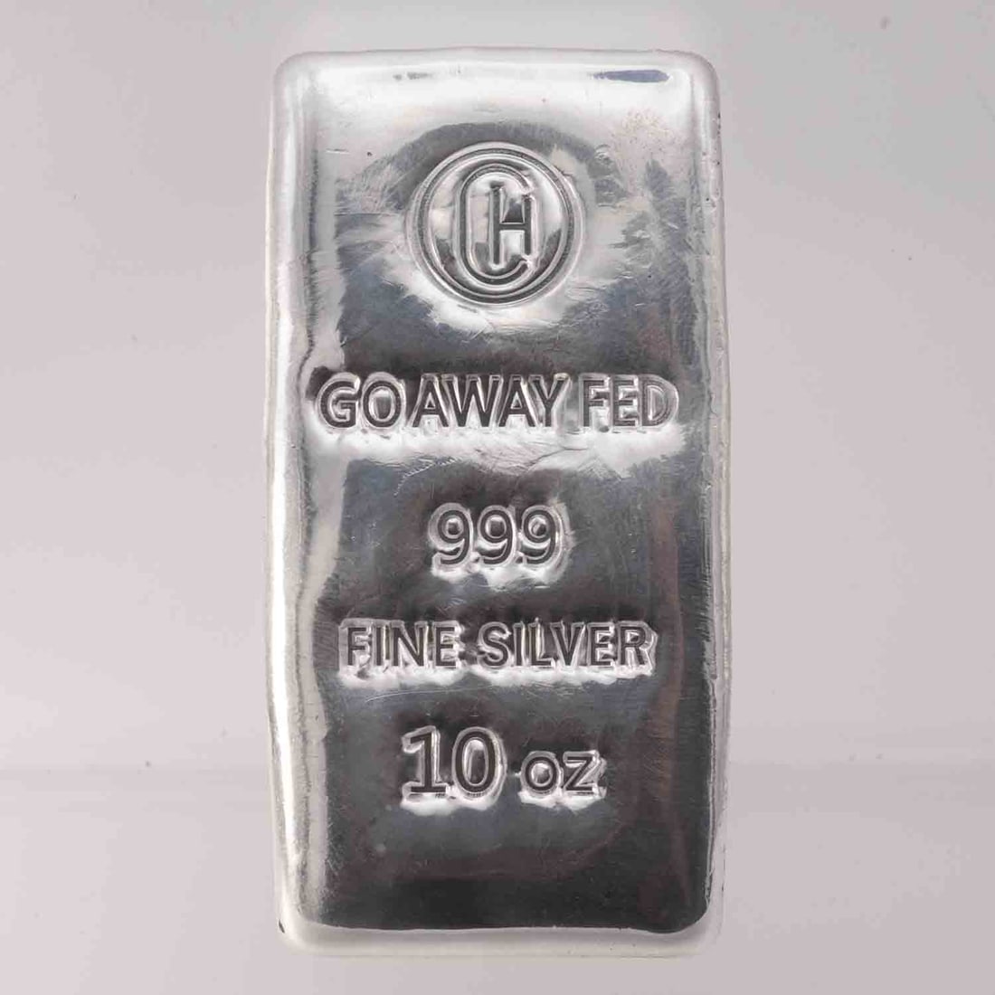 Go Away Fed Cast Poured 10oz Silver Bar: MLC01414 Provenance: Acquired from reputable coin dealers. Subject: Go Away Fed Cast Poured 10oz Silver Bar Medium: 999 SIlver Year: Condition: MS Note: Any condition statement is given as an opinion 