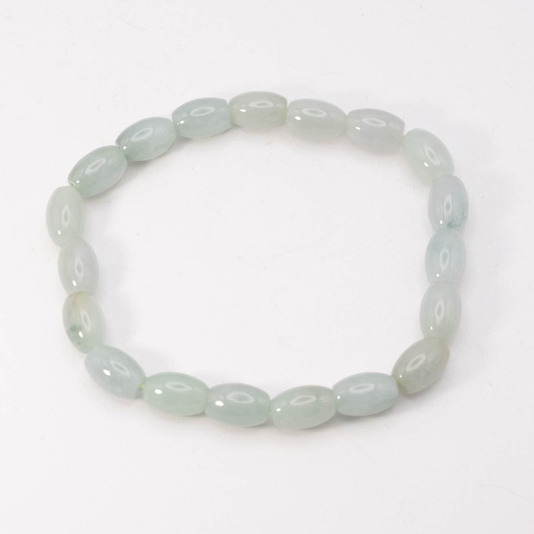 Chinese Carved Natural Pale Green Jadeite Lu Lu Tong Bead Bracelet: Medium: Natural Pale Green Jadeite Size: 6.5x9.5 mm Age/Detail: Chinese Carved Condition: great overall, check photo for condition reference. Provenance: Please view all the photos as they are part of