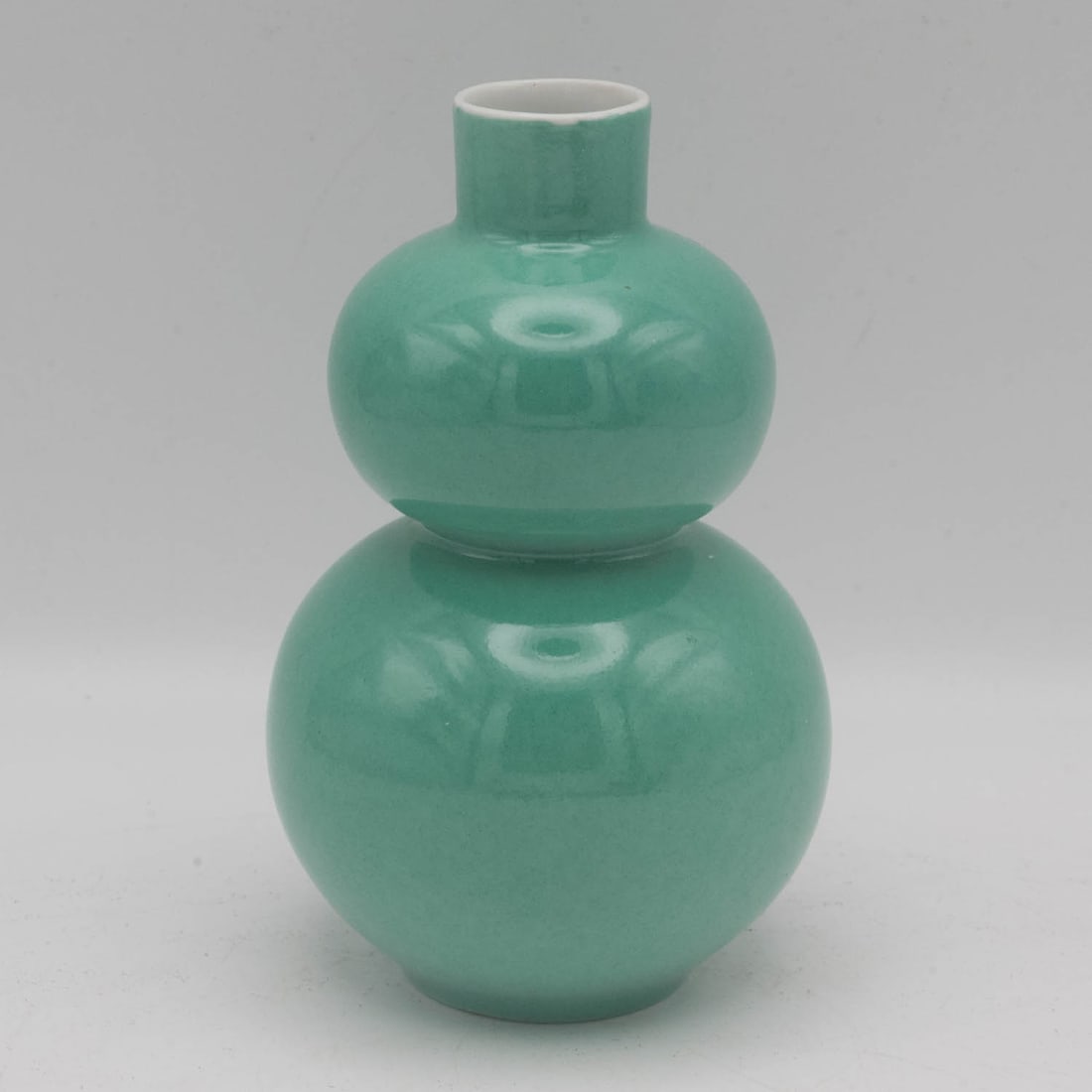 Chinese Export Jia Bo Shi Middle Kingdom Celadon Porcelain Double Gourd Vase: Medium: Celadon Porcelain Size: 2.8x2.8x4.5 inches Age/Detail: Chinese Export Jia Bo Shi Middle Kingdom Condition: great overall, check photo for condition reference. Provenance: Collection from Estat