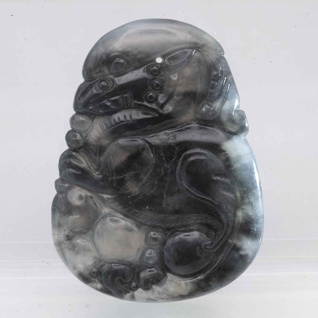 Chinese Carved Natural Jadeite Pendant: Medium: Natural Jadeite Size: 2.2x1.6x0.3 inches Age/Detail: Chinese Carved Condition: great overall, check photo for condition reference. Provenance: Collection from Estate in Tribecca Please view al