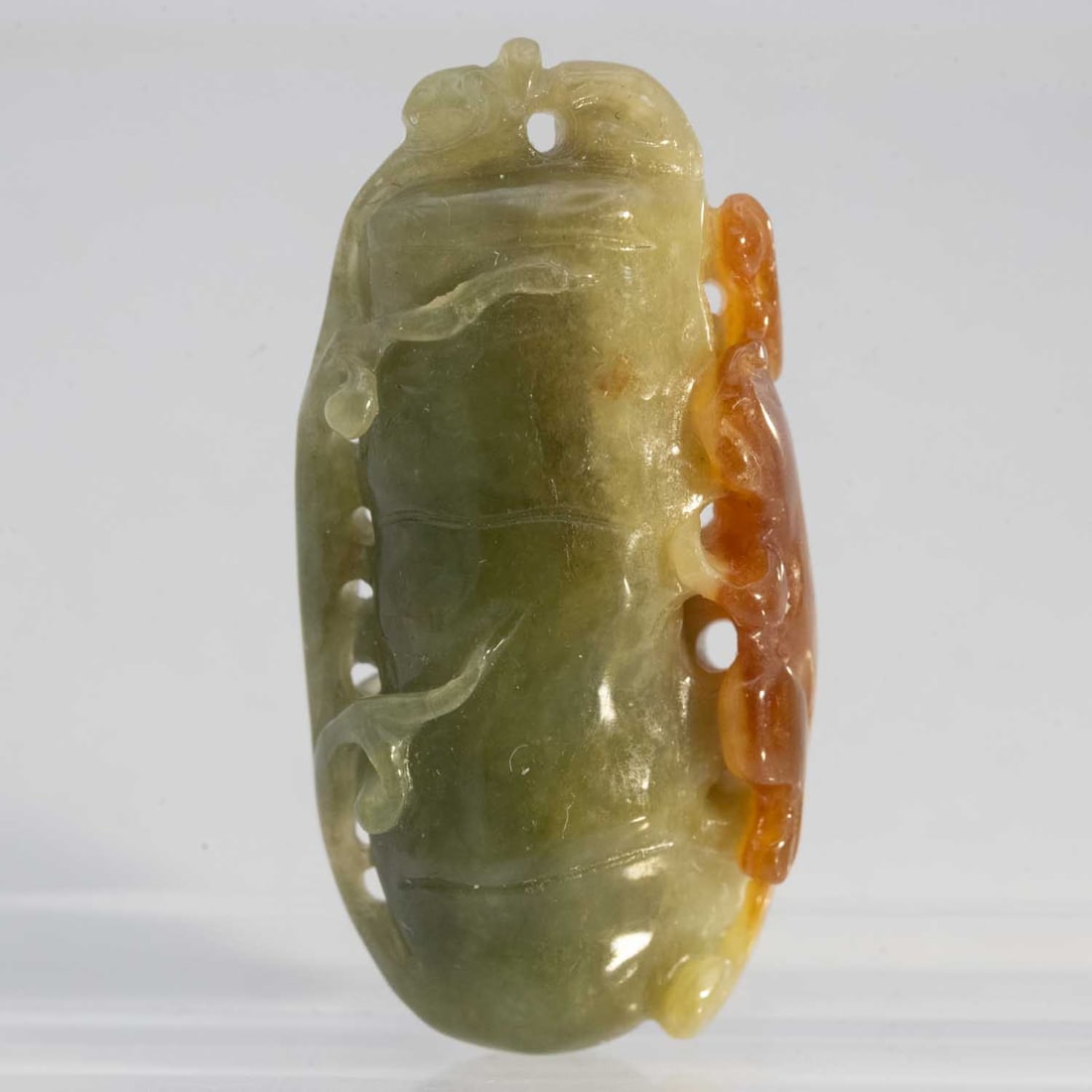 Chinese Carved Green And Red Jadeite Bamboo Pendant: Medium: Green And Red Jadeite Size: 1.2x0.6x0.4 inches Age/Detail: Chinese Carved Condition: great overall, check photo for condition reference. Provenance: Collection from Estate in Williamsburg Plea