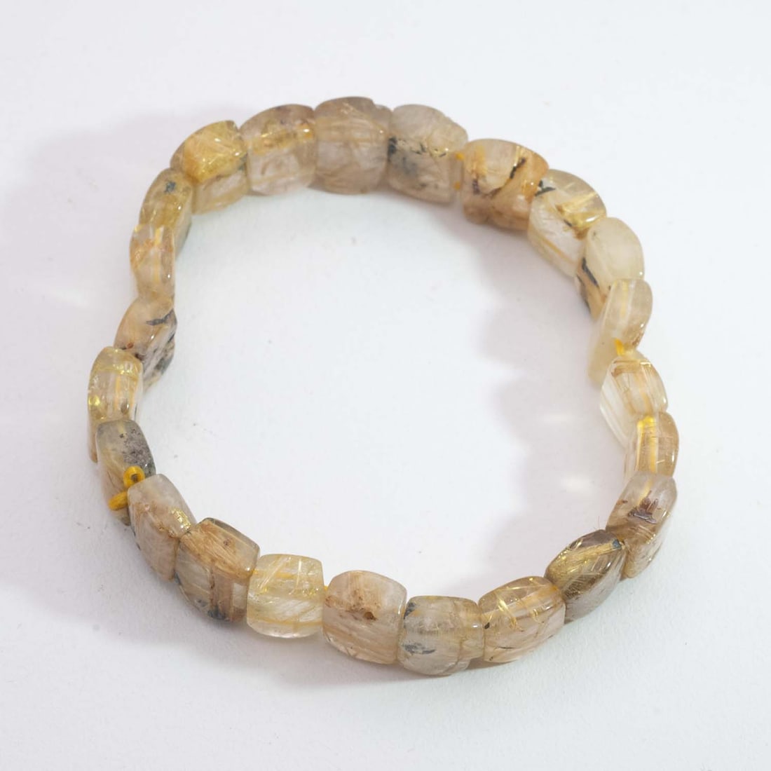 Natural Golden Rutilated Quartz Bracelet: Medium: Golden Rutilated Quartz Size: 11x9mm Age/Detail: Natural Condition: great overall, check photo for condition reference. Provenance: Collection from Estate in Williamsburg Please view all the