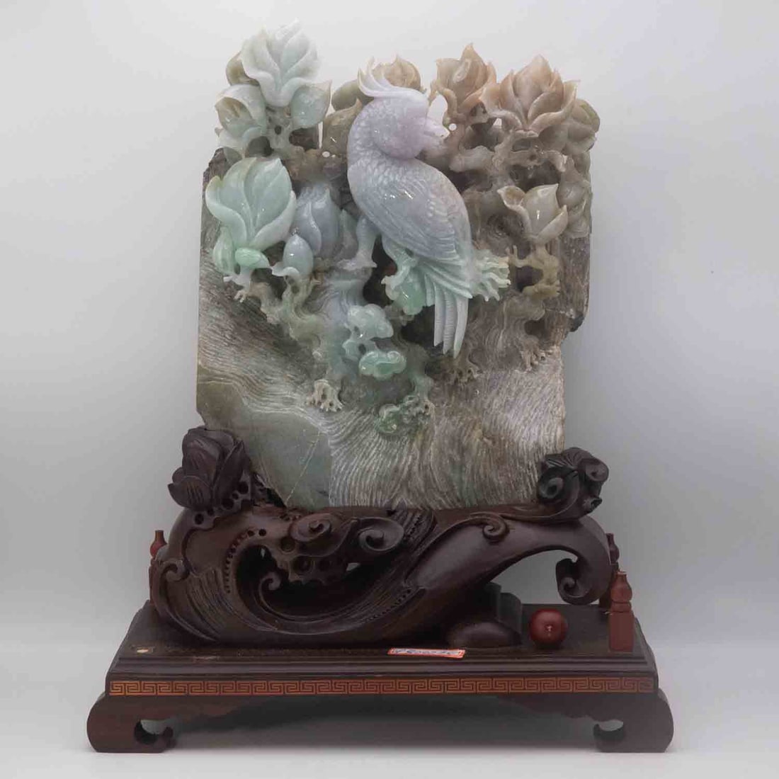 Large Chinese Natural Jadeite Boulder Phoenix & Flowers on Wood Stand: Medium: Natural Jadeite Boulder Size: 11.3x6x14 inches Age/Detail: Large Chinese Condition: great overall, check photo for condition reference. Provenance: Please view all the photos as they are part 