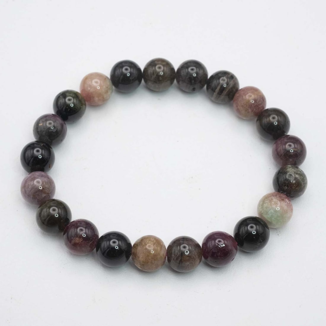 Natural Tourmaline Bead Bracelet: Medium: Tourmaline Size: 9mm diameter each bead Age/Detail: Natural Condition: great overall, check photo for condition reference. Provenance: Collection from Estate in Williamsburg Please view all th