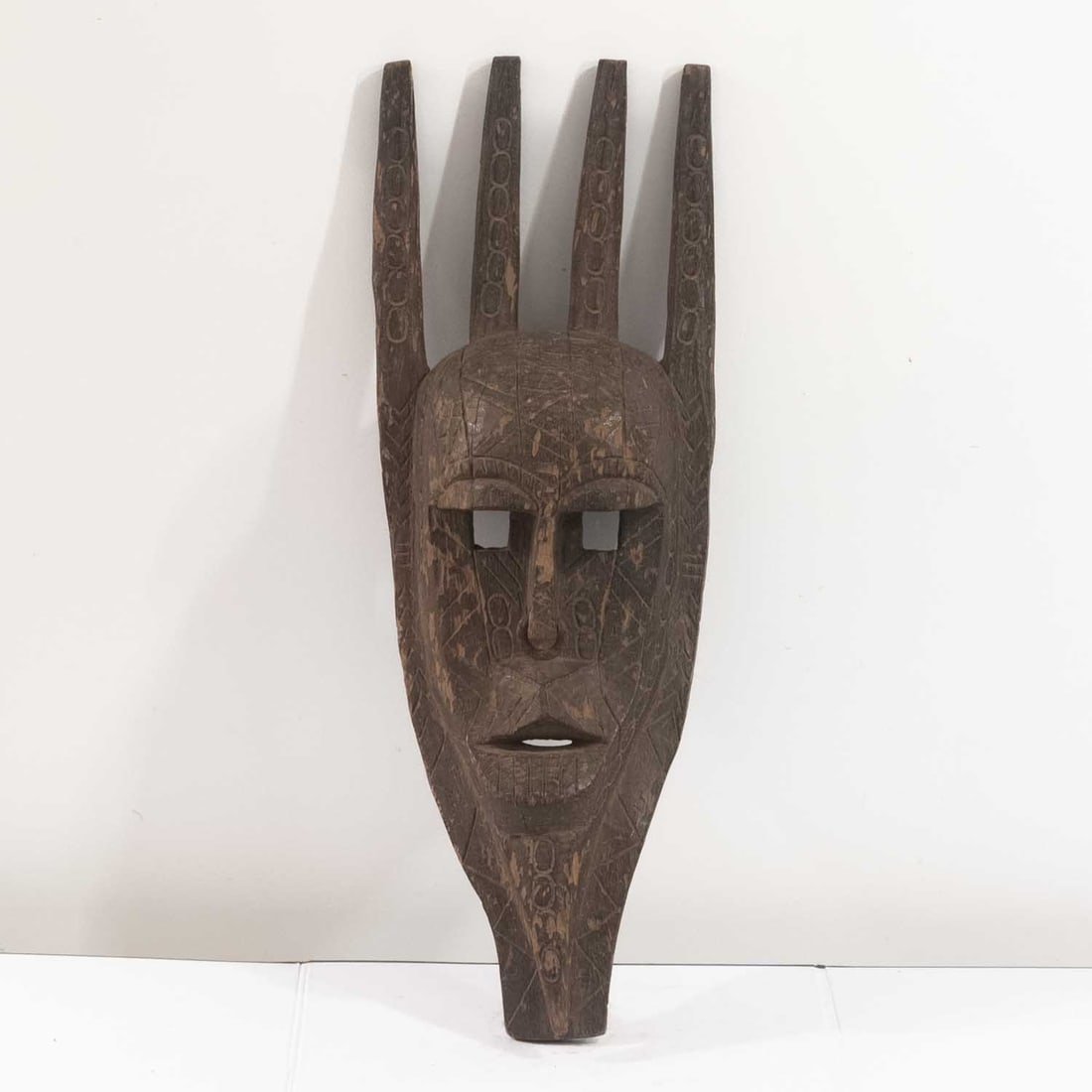 Antique 20th C. African Bamana N'Tomo Four-Spike Wood Mask, Mali: Medium: WoodSize: 7.6x5.3x22 inchesAge/Detail: Antique 20th C. African Bamana N'Tomo Four-SpikeCondition: great overall, check photo for condition reference.Provenance:Please view all the photos as th