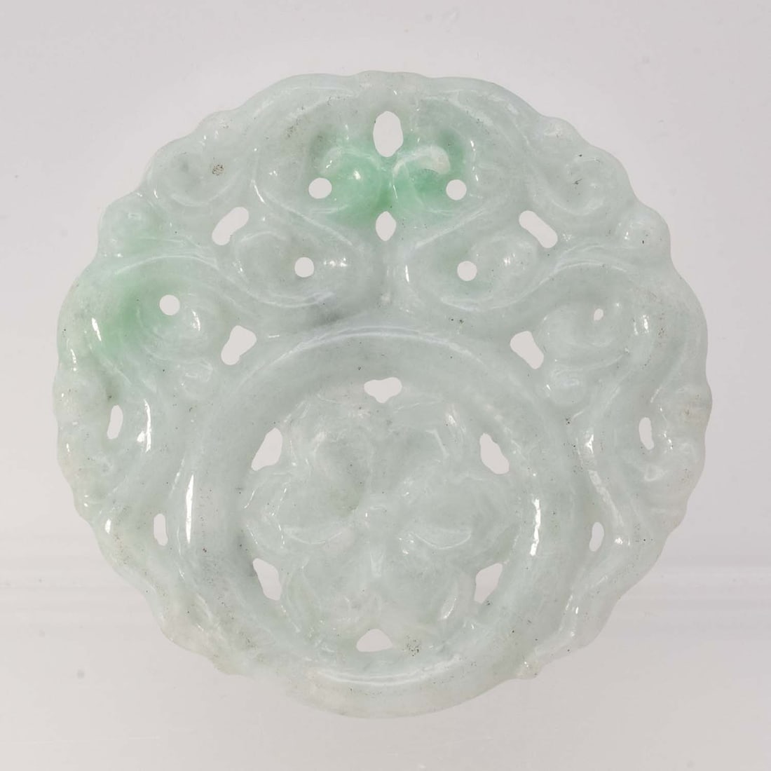 Chinese Carved Natural Pale Green Jadeite Openwork Pendant: Medium: Natural Pale Green JadeiteSize: 2x2x0.3 inchesAge/Detail: Chinese CarvedCondition: great overall, check photo for condition reference.Provenance:Please view all the photos as they are part of