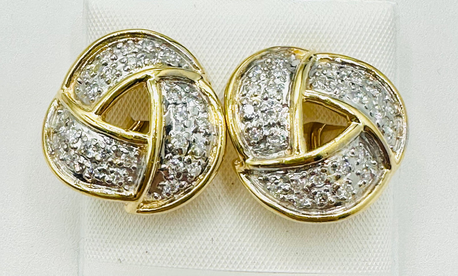 Pair of Natural Diamond Earrings, 14KT Yellow Gold # 2411: # 2411 Pair of Natural Diamond Earrings, 14KT Yellow Gold 54 pieces diamond 1.25 carats ( t.w.) Omega backs Earrings Weight: 11.00 grams(t.w.) Earrings Size: 21 mm x 21 mm