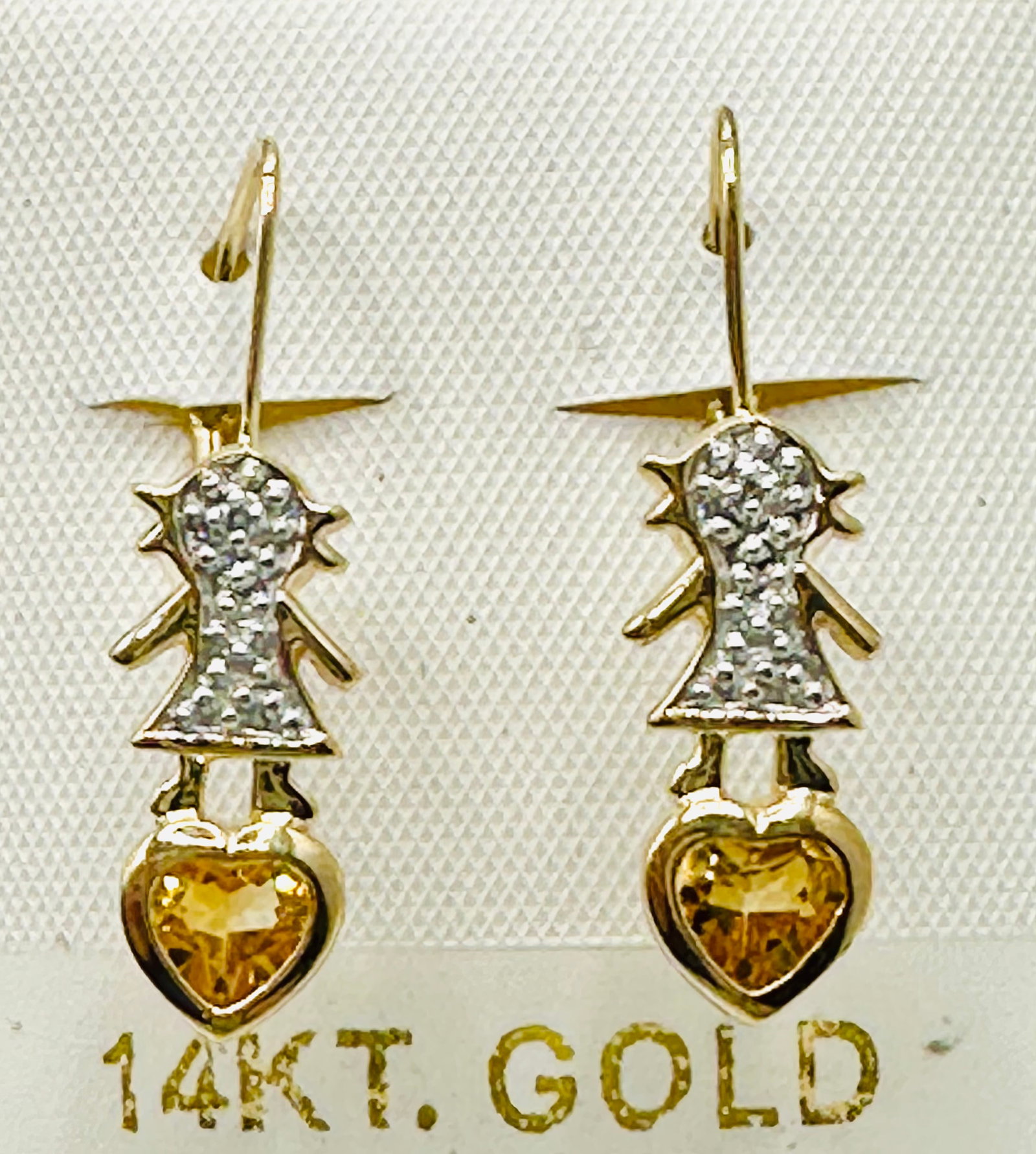 Pair of Natural Diamond and Yellow Topaz Earrings, 14KT Yellow Gold # 2558: # 2558 Pair of Natural Diamond and Yellow Topaz Earrings, 14KT Yellow Gold 2 pieces diamond 0.02 carat(t.w.) 2 pieces heart shape yellow topaz Earrings Weight: 2.70 grams(t.w.) Lever-backs Closure App