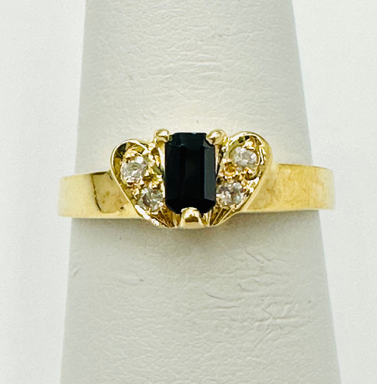 Natural Sapphire and Diamond Ring,14KT Yellow Gold # 2672: # 2672 Natural Sapphire and Diamond Ring,14KT Yellow Gold 4 pieces diamond 0.10 carat(t.w.) 1 piece emerald cut sapphire 0.30 carat Ring Weight: 2.80 grams(t.w.) Ring Size: 5.75