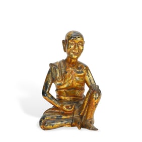 A Lacquered Gold Wood Carved Buddha Statue