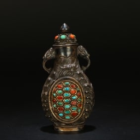 A Silver Snuff Bottle