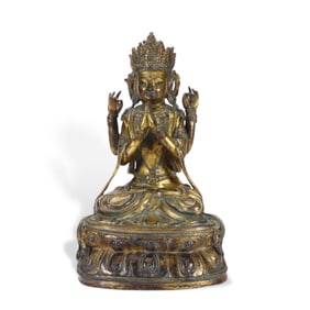 A gilded copper Guanyin