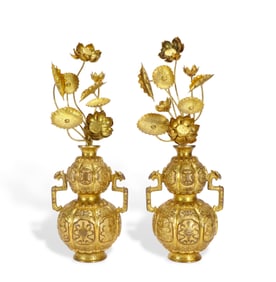 A pair of gilded Chinese copper vases