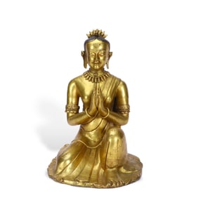 A gilded Chinese copper Buddha statue
