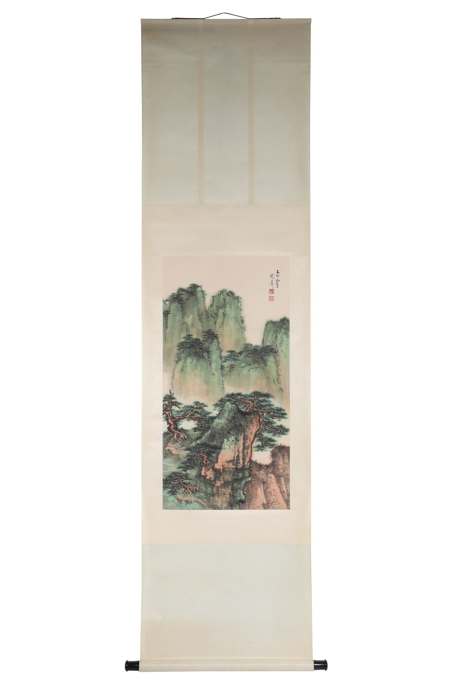 A Chinese Landscape Painting, Signed by Xie Zhiliu: A Chinese landscape painting, signed by Xie Zhiliu, featuring two seals. Drawing green mountains and trees on paper in color. Hanging scroll. H: 89cm W: 44.5cm (painting)